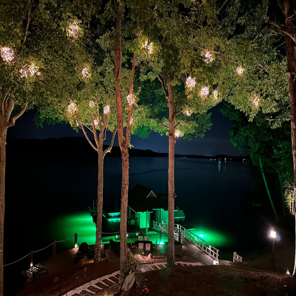 Sea floor green underwater dock light creating a glow for night fishing