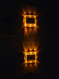 Low‑profile solar dock light marking the edge of a pier at night.